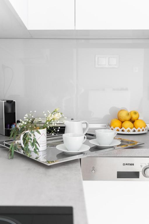 Kuchyňa alebo kuchynka v ubytovaní Maison Penthouse by Luxlikehome