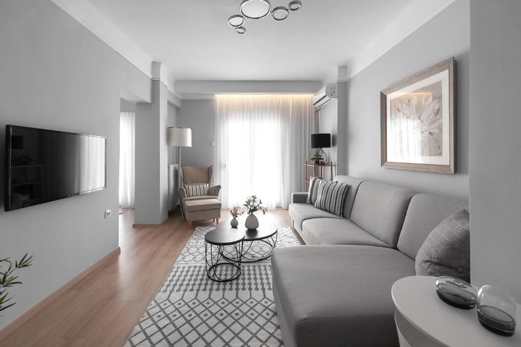 Televízia a/alebo spoločenská miestnosť v ubytovaní Maison Penthouse by Luxlikehome