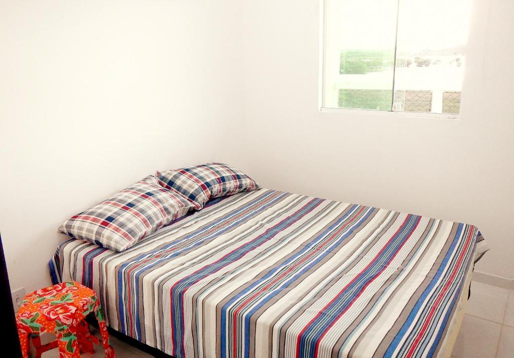 Cama o camas de una habitación en Solar Teixeira Residencial