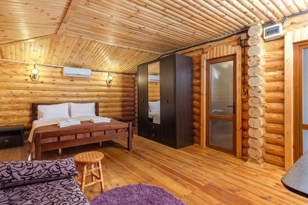 Postel nebo postele na pokoji v ubytování AKVALIS комплекс для отдыха