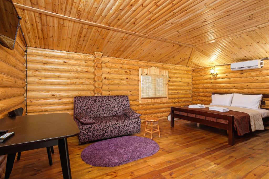 Postel nebo postele na pokoji v ubytování AKVALIS комплекс для отдыха