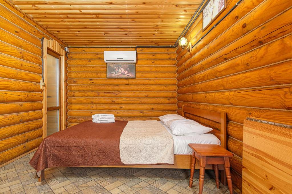 Postel nebo postele na pokoji v ubytování AKVALIS комплекс для отдыха