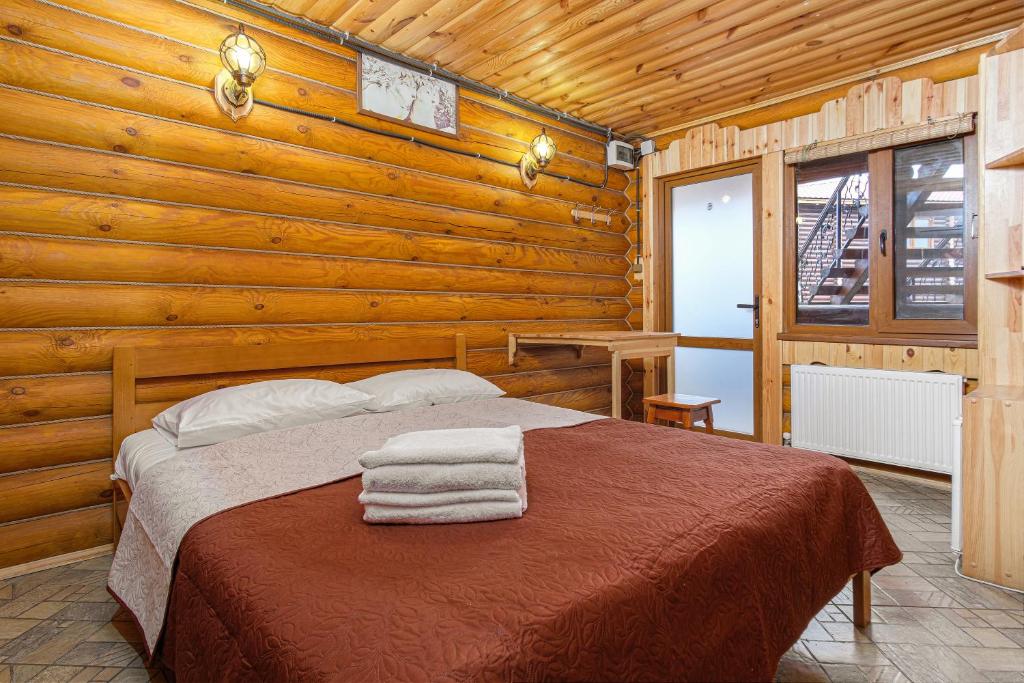 Postel nebo postele na pokoji v ubytování AKVALIS комплекс для отдыха