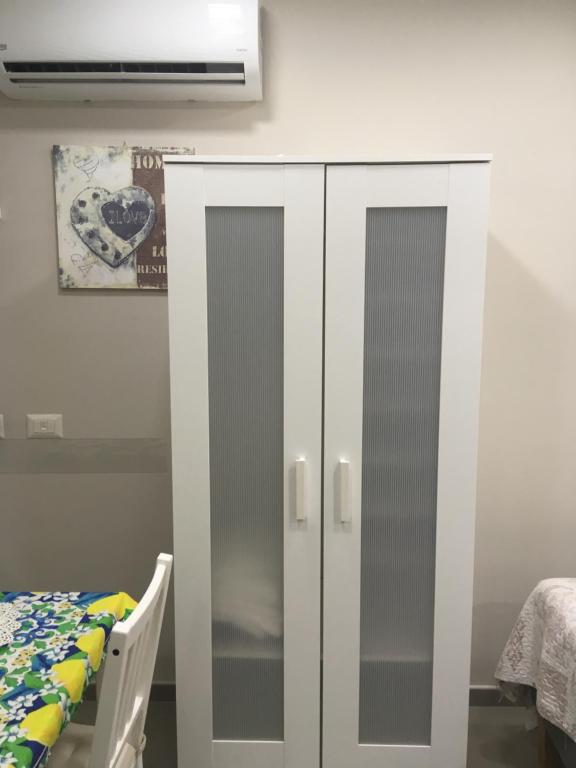 Łóżko lub łóżka w pokoju w obiekcie casa piano zero