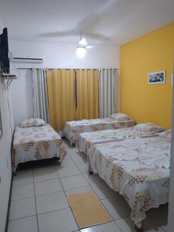 Postel nebo postele na pokoji v ubytování Pousada Costa dos Corais