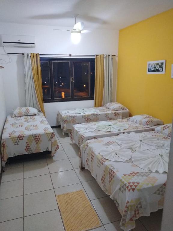 Postel nebo postele na pokoji v ubytování Pousada Costa dos Corais