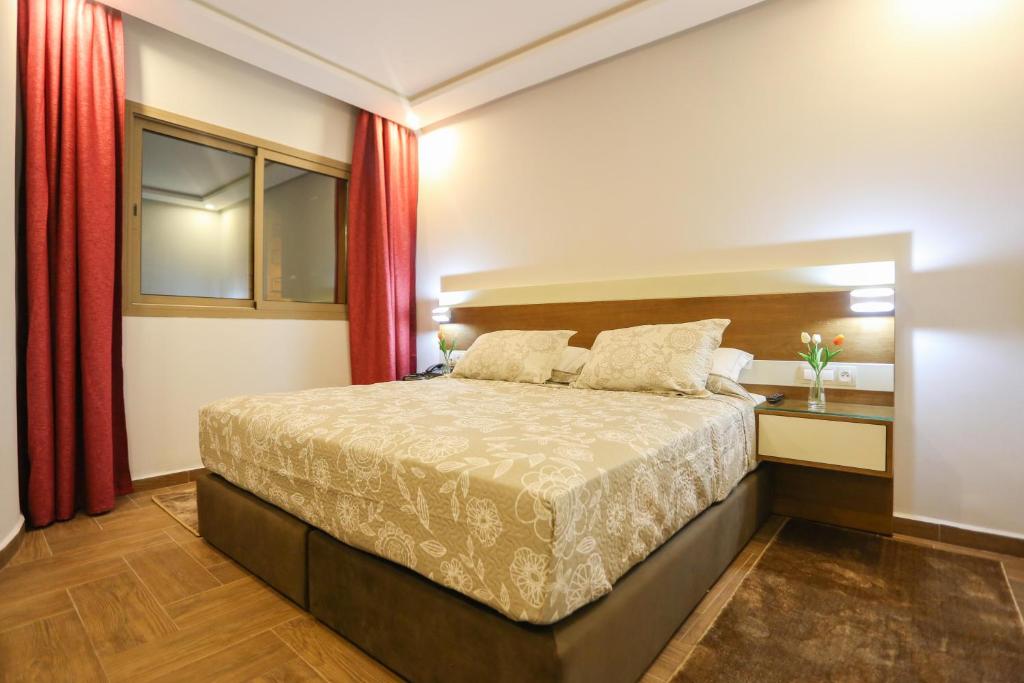 Postel nebo postele na pokoji v ubytování HOTEL MAKARIM TETOUAN