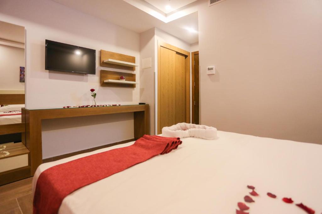 Postel nebo postele na pokoji v ubytování HOTEL MAKARIM TETOUAN
