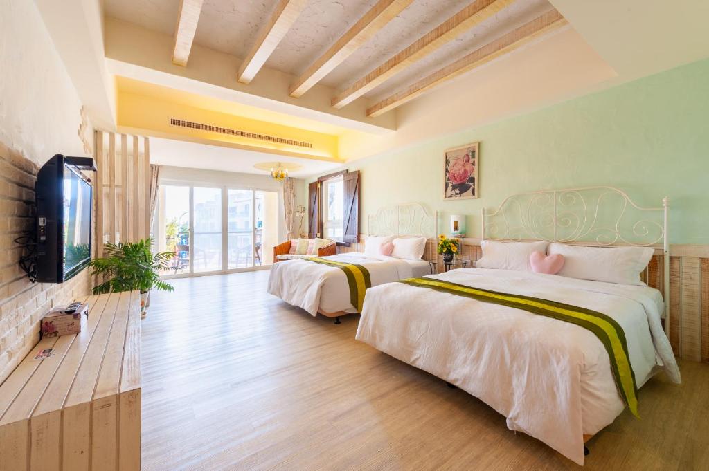 Una cama o camas en una habitación de Mong Shan Homestay