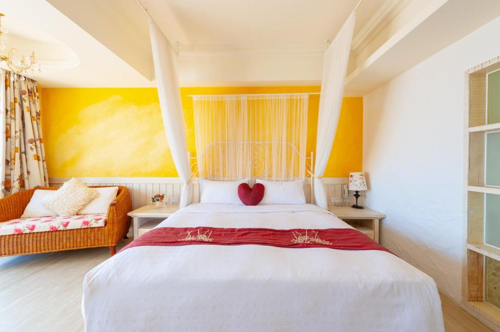 Una cama o camas en una habitación de Mong Shan Homestay