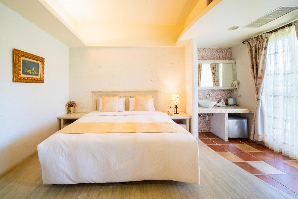 Una cama o camas en una habitación de Mong Shan Homestay