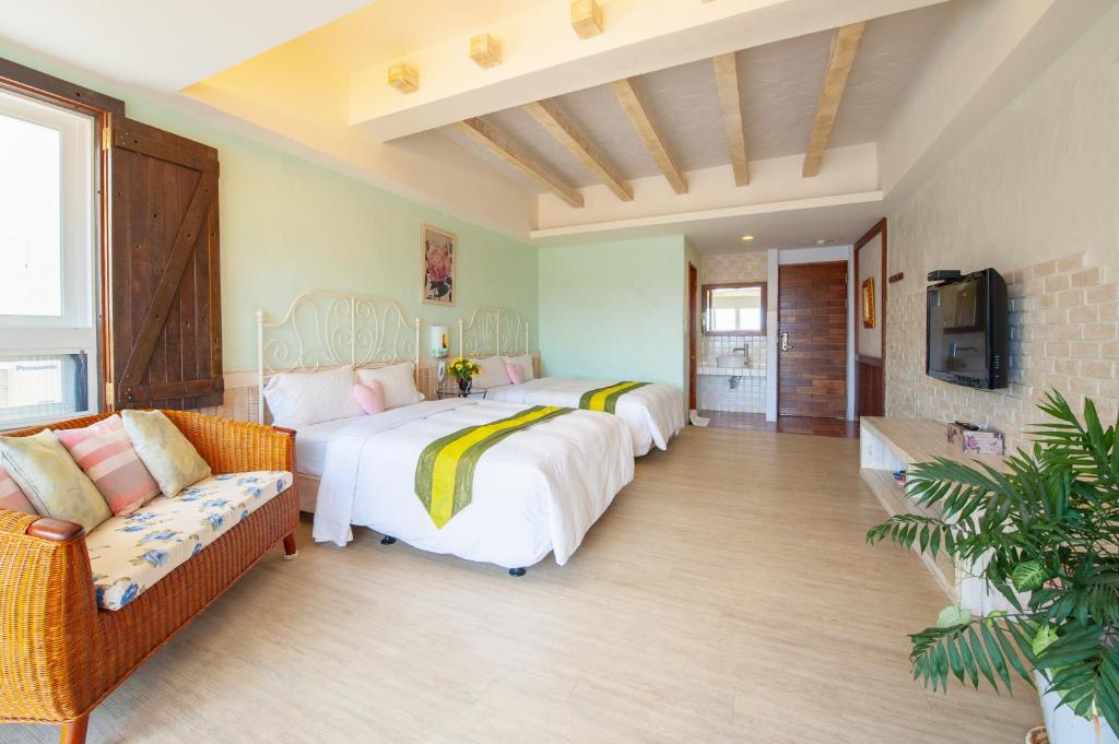 Una cama o camas en una habitación de Mong Shan Homestay