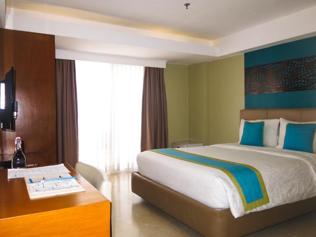 Postel nebo postele na pokoji v ubytování Boracay Haven Resort