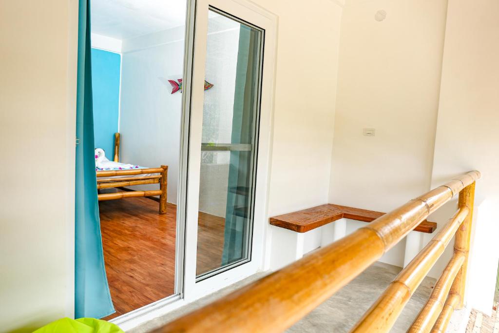 Postel nebo postele na pokoji v ubytování Lunazul Guesthouse