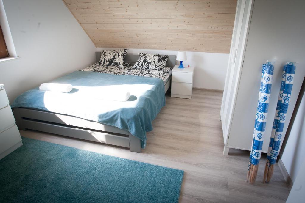 Postel nebo postele na pokoji v ubytování Domki Reston
