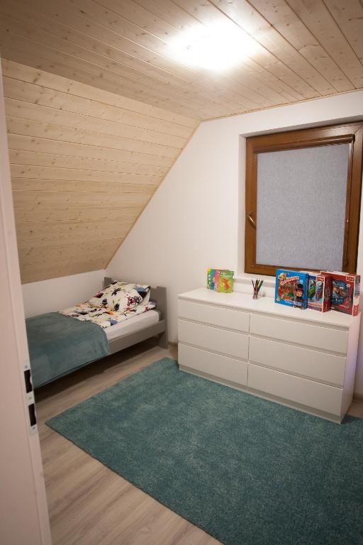Postel nebo postele na pokoji v ubytování Domki Reston