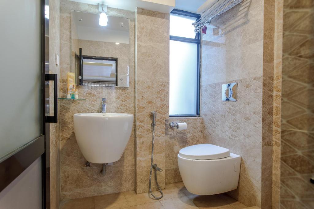 Koupelna v ubytování Hotel Shreesu