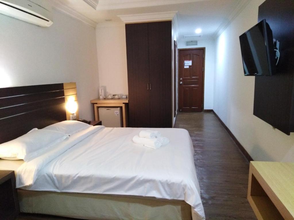 Postel nebo postele na pokoji v ubytování Sara Hotel