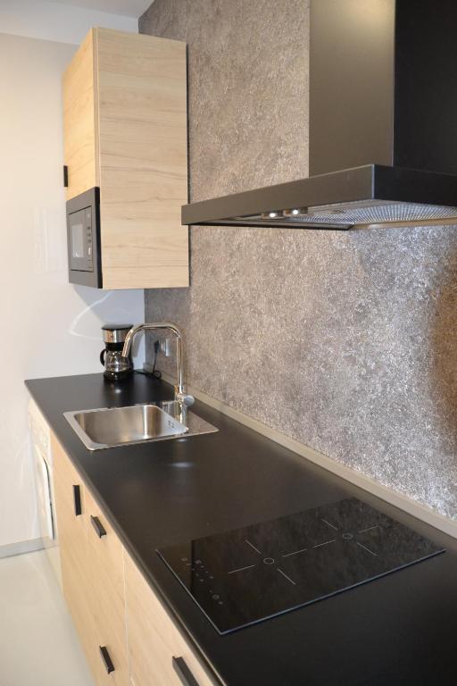 Kuchyňa alebo kuchynka v ubytovaní Apartamentos Mk77 León- San Isidoro
