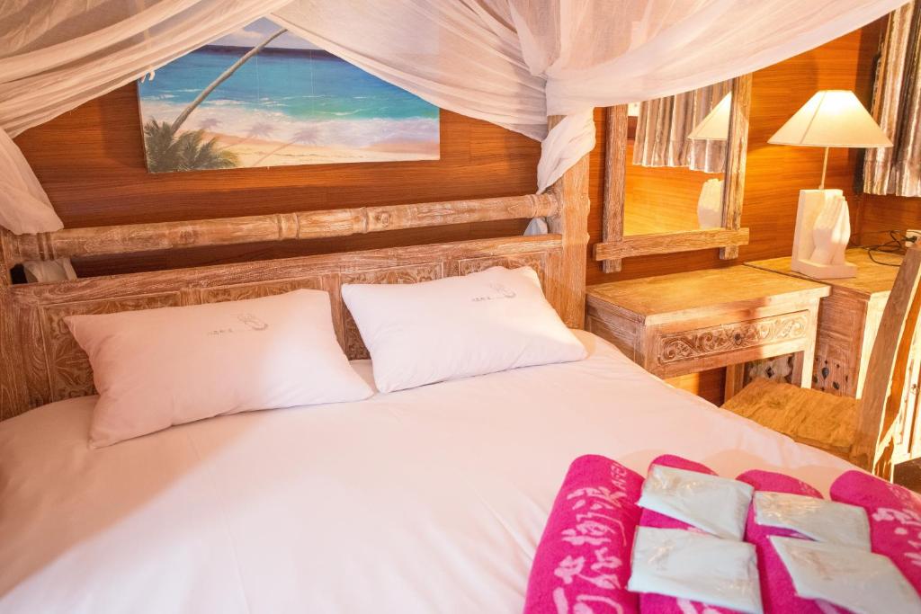 Postel nebo postele na pokoji v ubytování Kenting Afei Surf Hostel Nanwan