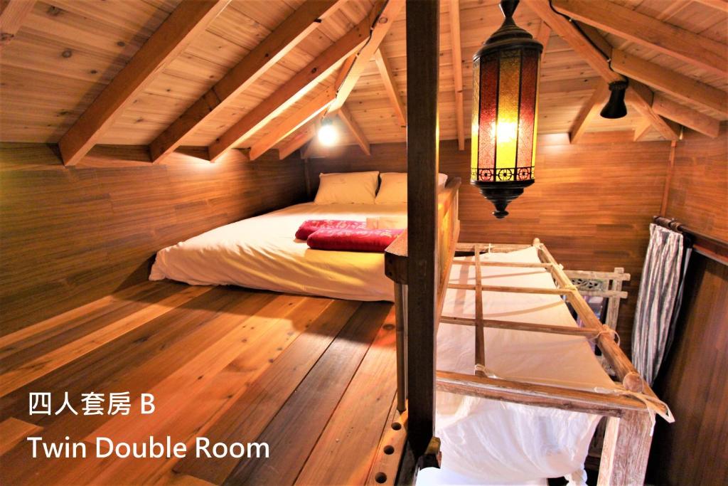 Postel nebo postele na pokoji v ubytování Kenting Afei Surf Hostel Nanwan