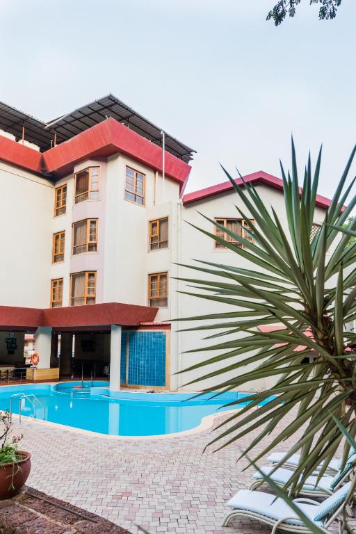 a view of the hotel from the pool at Chances Resort and Casino An Indy Resort in Panaji