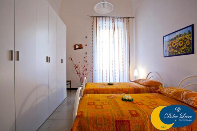 Postel nebo postele na pokoji v ubytování Dolce Lecce B&B