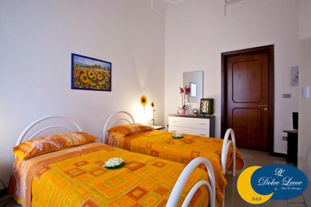 Postel nebo postele na pokoji v ubytování Dolce Lecce B&B