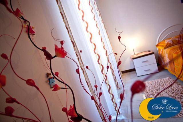 Postel nebo postele na pokoji v ubytování Dolce Lecce B&B