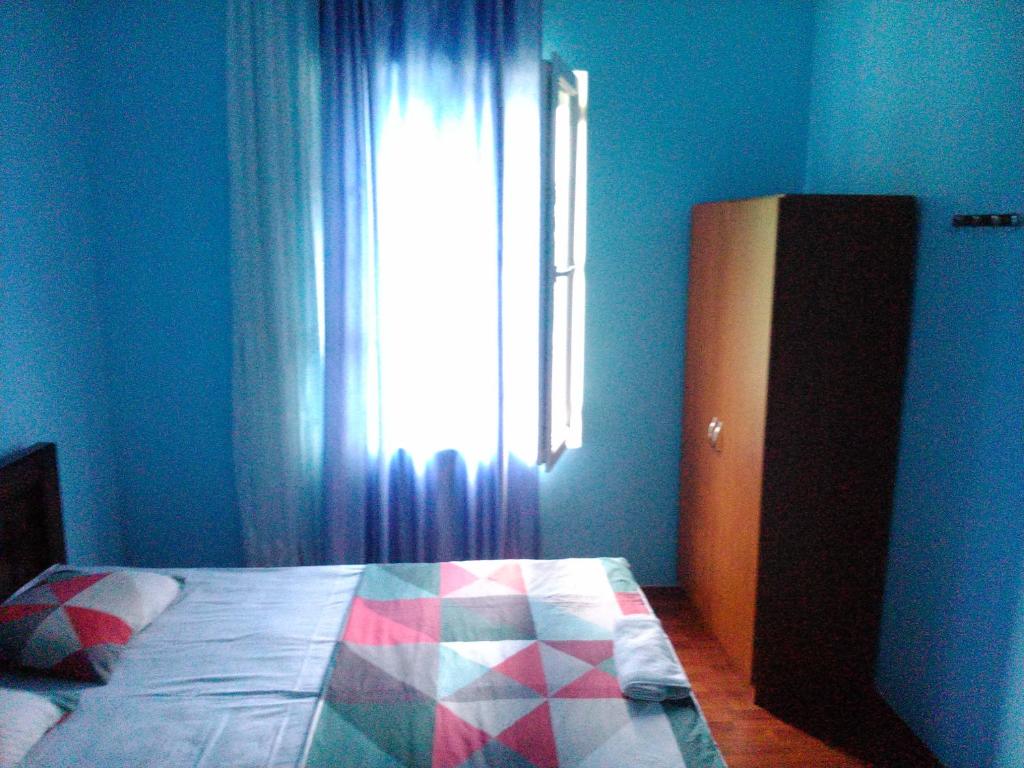 Postel nebo postele na pokoji v ubytování Guest house maka