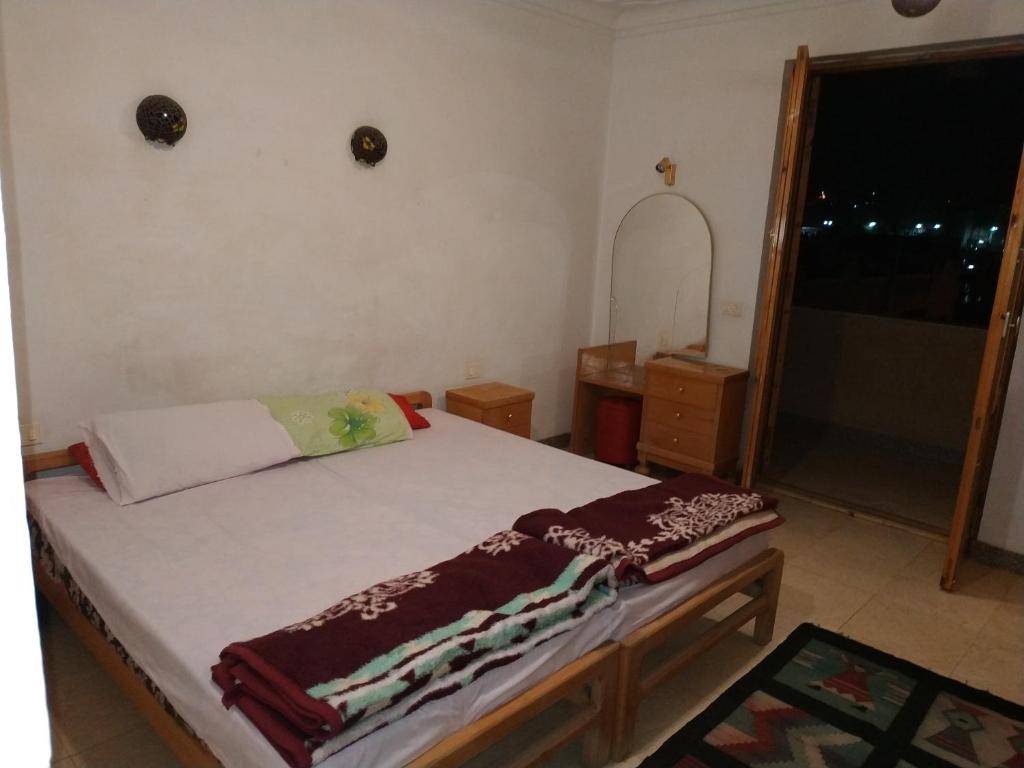Postel nebo postele na pokoji v ubytování Adad Noubian House