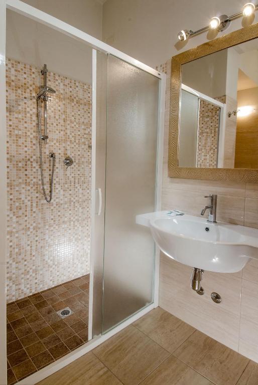 Koupelna v ubytování Hotel Lido