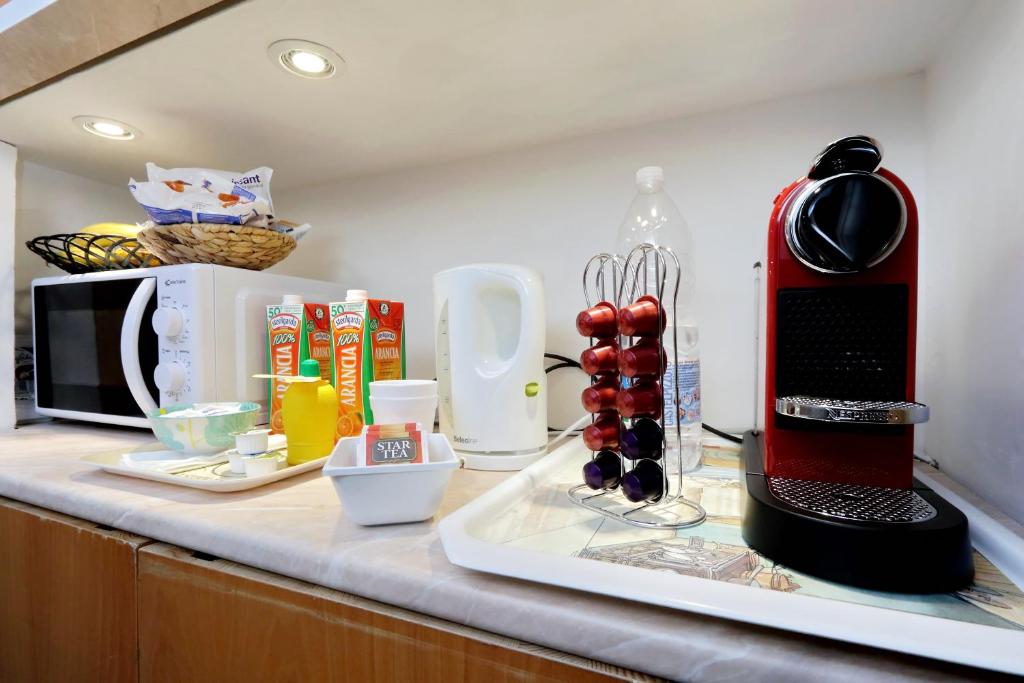 Una cocina o zona de cocina en Gialli Vatican Guesthouse