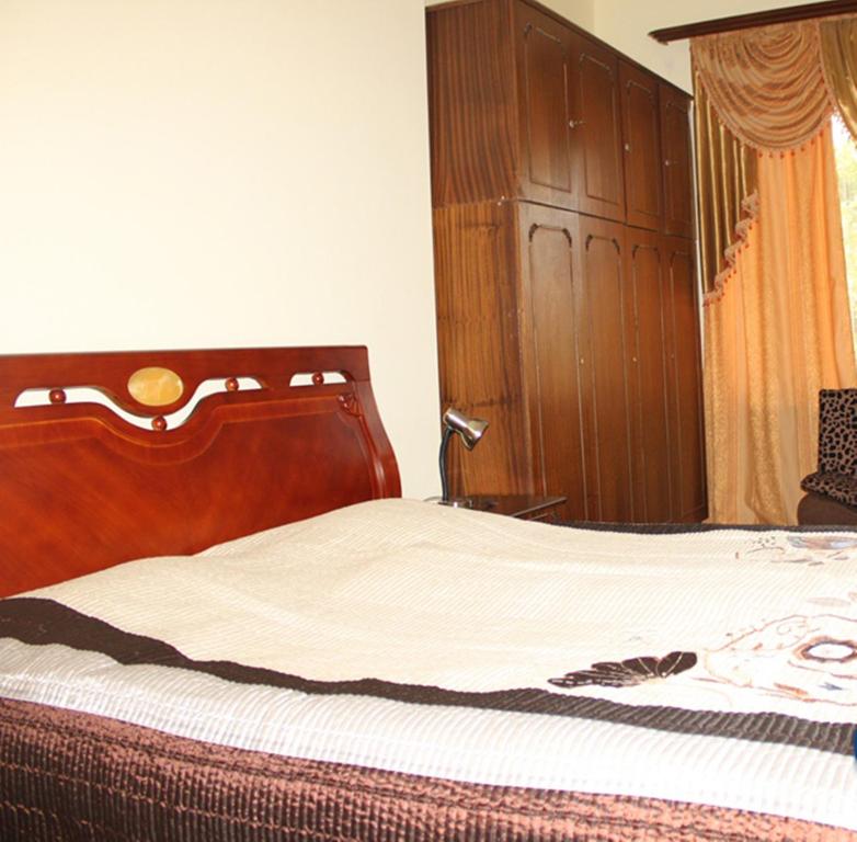 Postel nebo postele na pokoji v ubytování Hotel Elegant