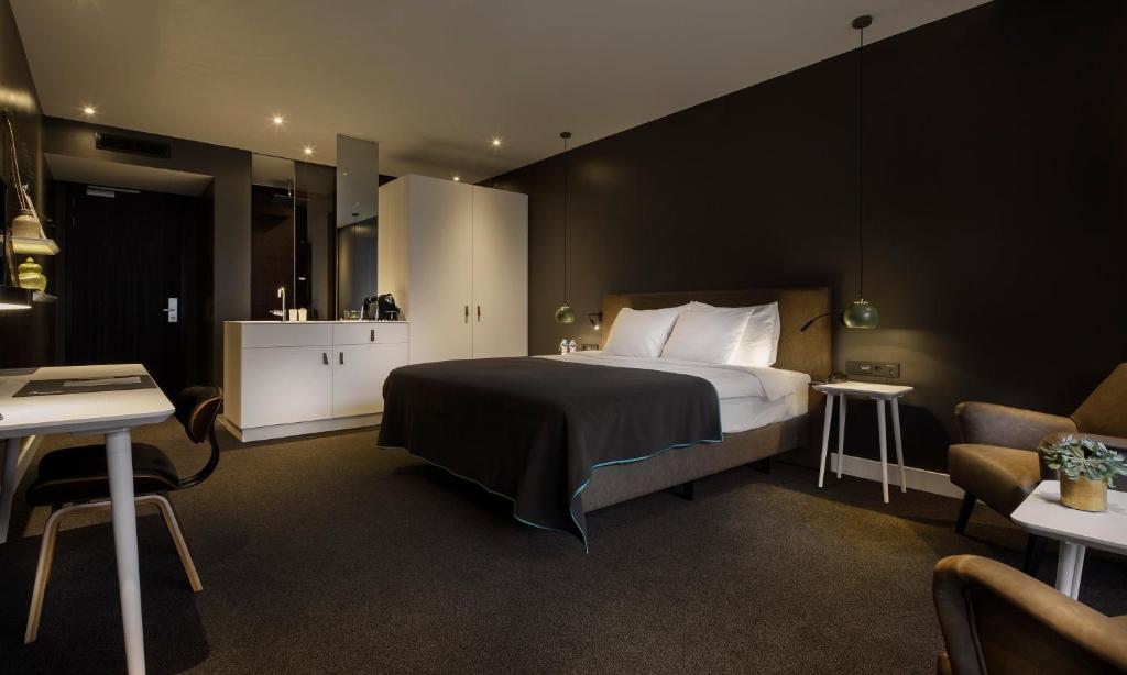 Postel nebo postele na pokoji v ubytování Van der Valk Hotel Sassenheim - Leiden