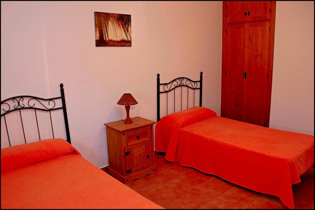 Łóżko lub łóżka w pokoju w obiekcie Apartamento con piscina comunitaria