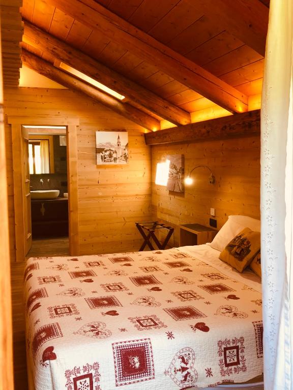 Postel nebo postele na pokoji v ubytování Baita Fraina
