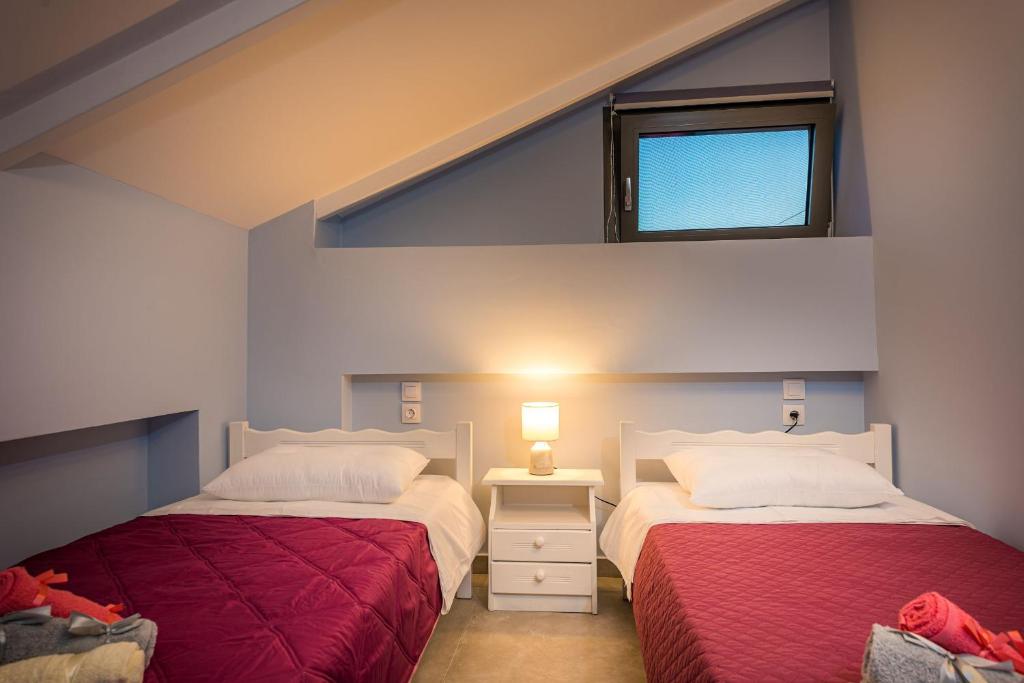 Postel nebo postele na pokoji v ubytování Vizantida Maisonette, By TK Property Management