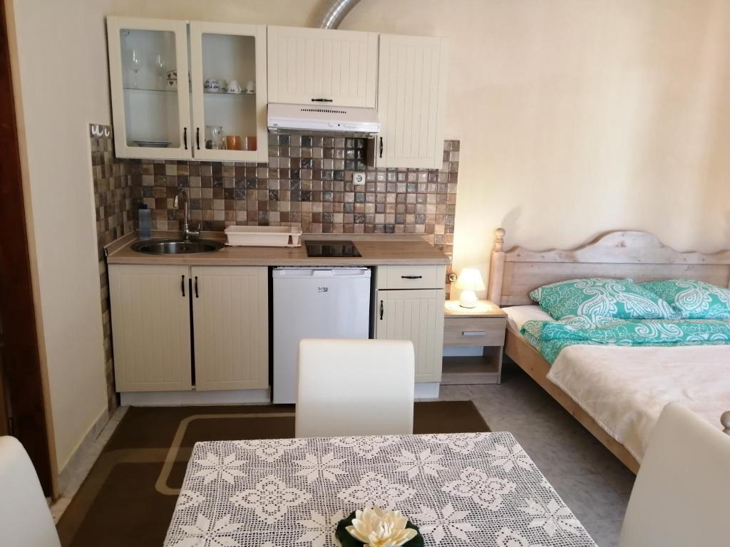 Kuchyň nebo kuchyňský kout v ubytování Apartmani Vinka