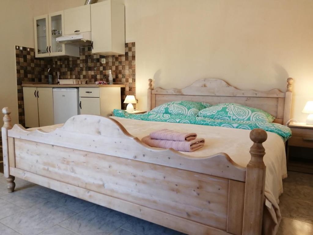 Postel nebo postele na pokoji v ubytování Apartmani Vinka