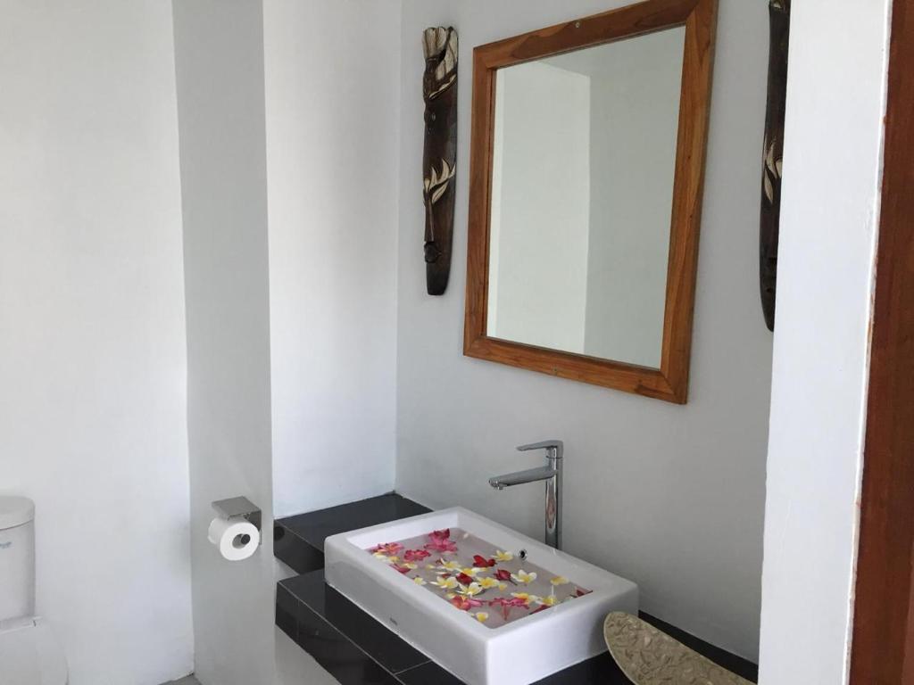 Postel nebo postele na pokoji v ubytování PITAMATA VILLAS