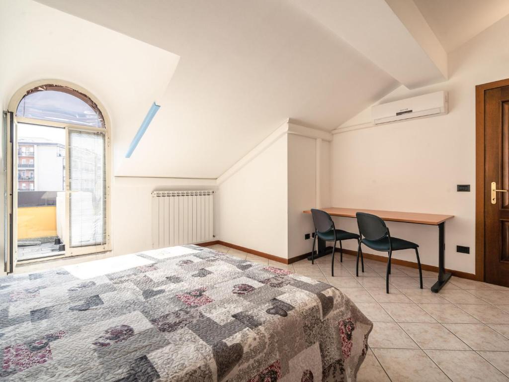 Posteľ alebo postele v izbe v ubytovaní Belvilla by OYO Casa Pedroni 1
