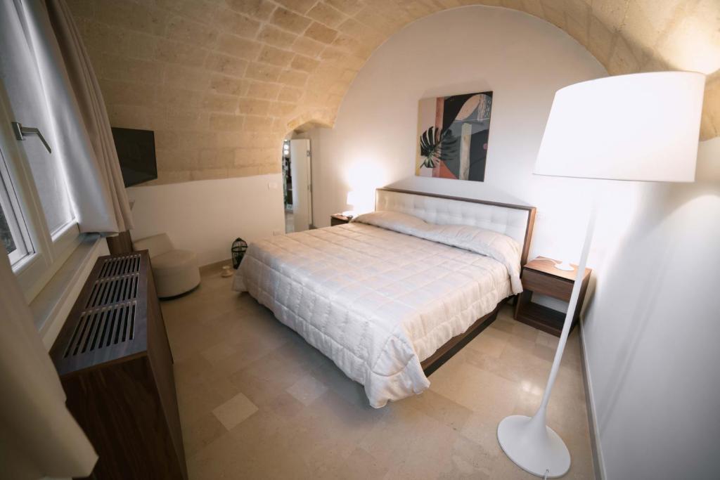 Postel nebo postele na pokoji v ubytování Albergo Del Sedile