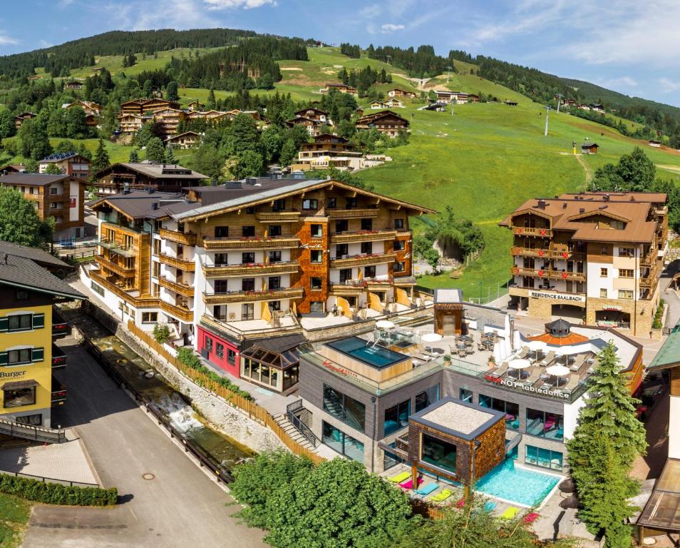 an aerial view of a town with buildings at Hotel Kendler in Saalbach-Hinterglemm