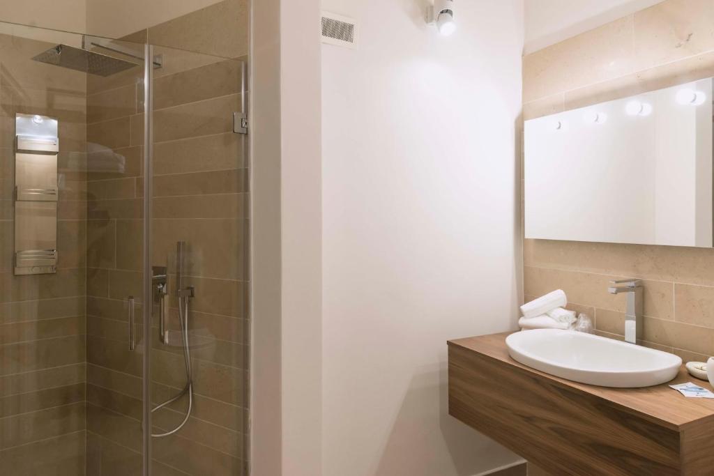 Koupelna v ubytování Albergo Del Sedile