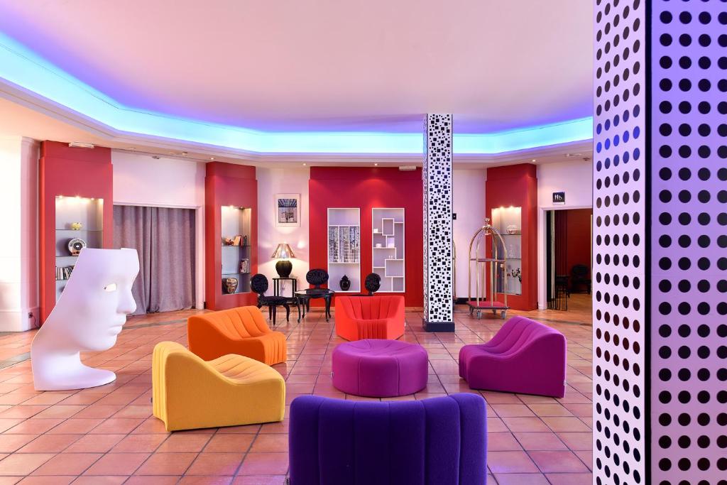 Posezení v ubytování Hôtel Arles Plaza