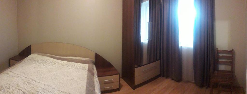 Postel nebo postele na pokoji v ubytování GergHouse