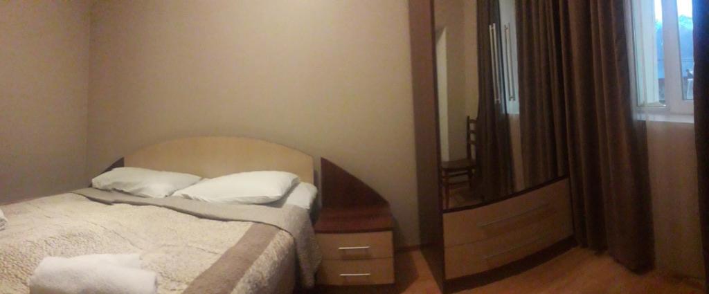 Postel nebo postele na pokoji v ubytování GergHouse