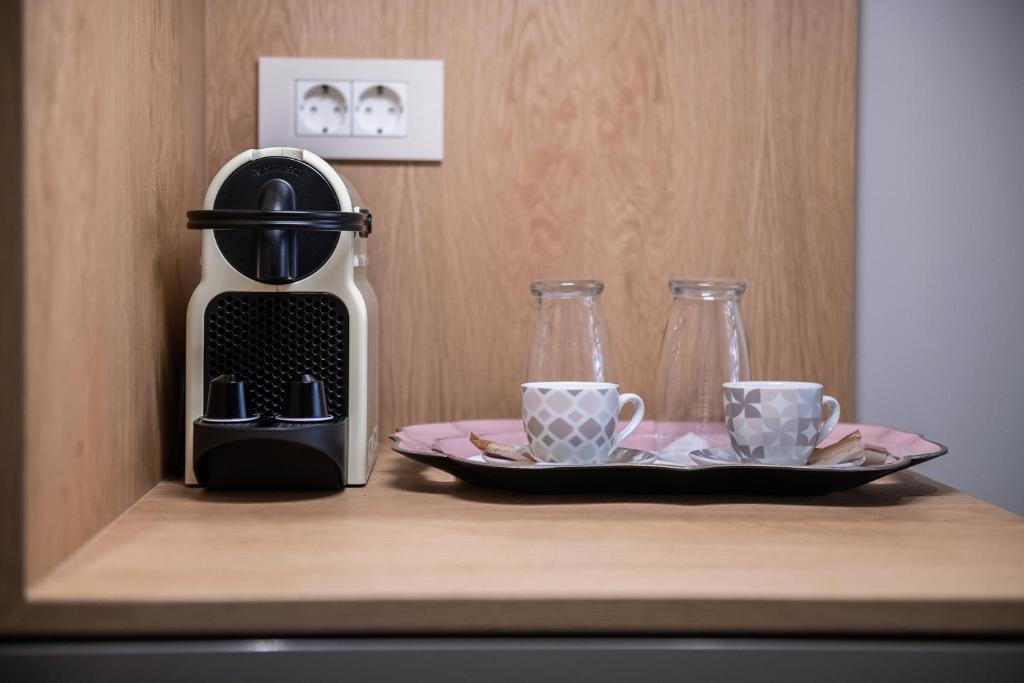 Viaggio Elegant Rooms - 9