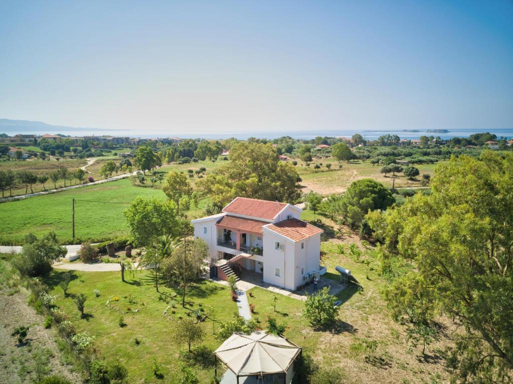 an aerial view of a house in a field at Villa Anna Maria in Lixouri